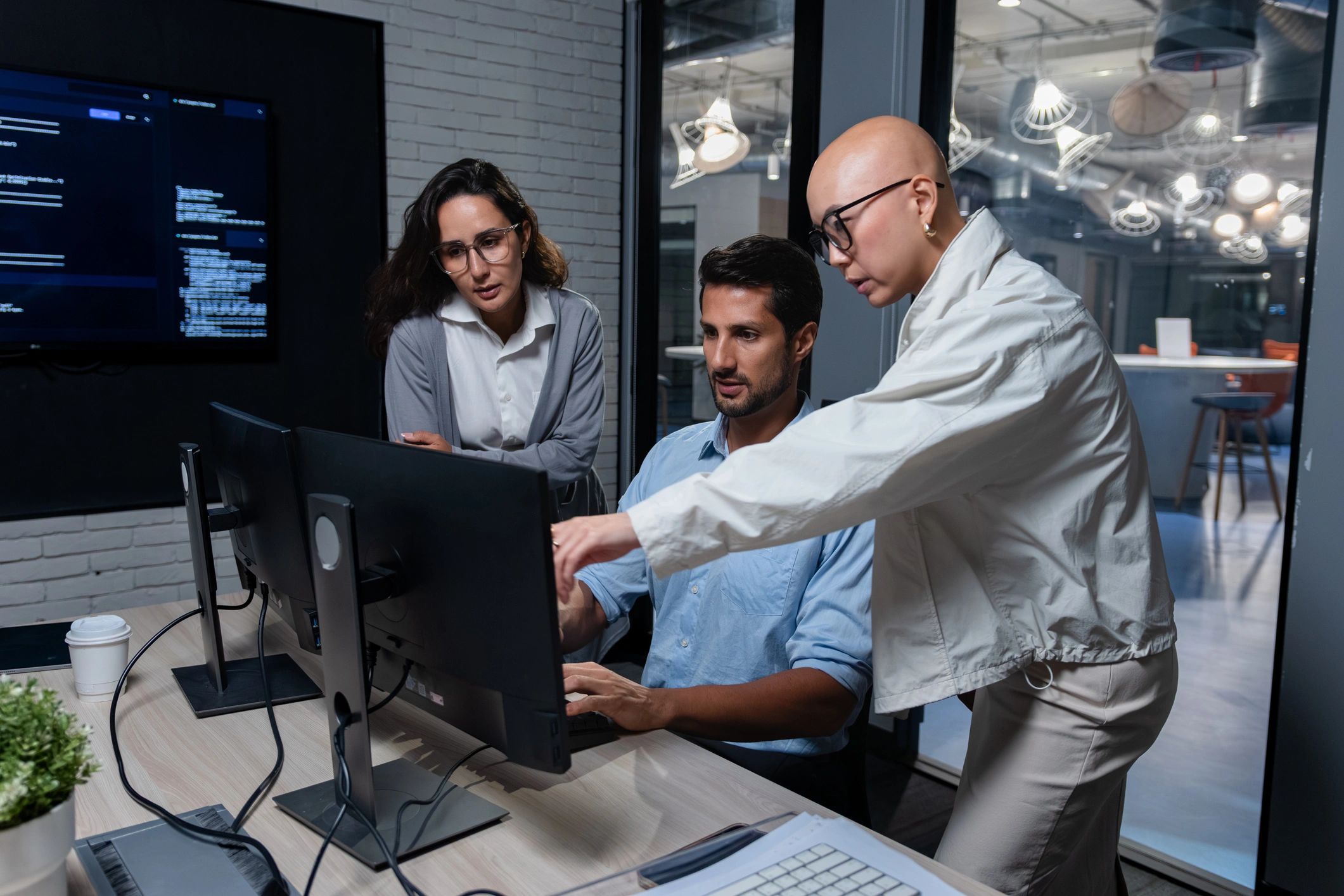 IT professionals collaborating in a modern office